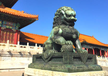 门口放石狮子的寓意